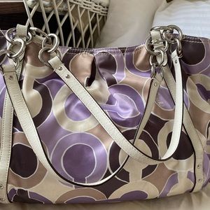 Coach lavender handbag with leather trim.
